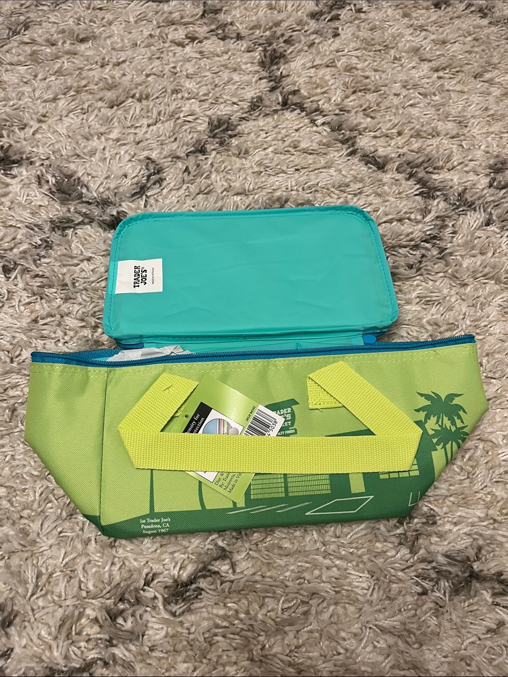 Trader Joe’s mini insulated bag. New with tag. Lime green. Blue.